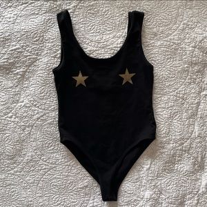 Black Rave Bodysuit with Gold Star Detailing